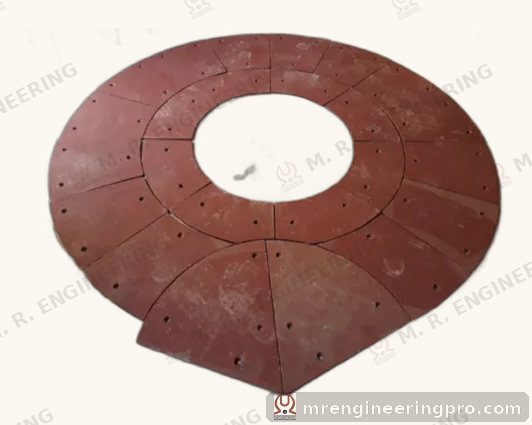 Mixer bottom plate liner segments for batching plant